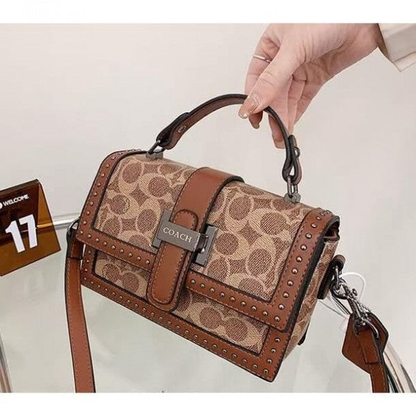 Coach
Studded Flap Sling Bag