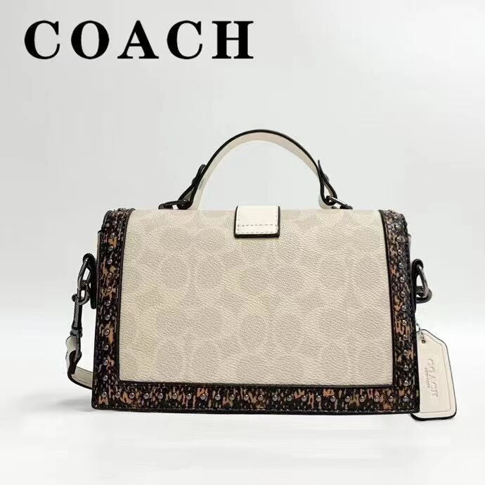 Coach
Studded Flap Sling Bag