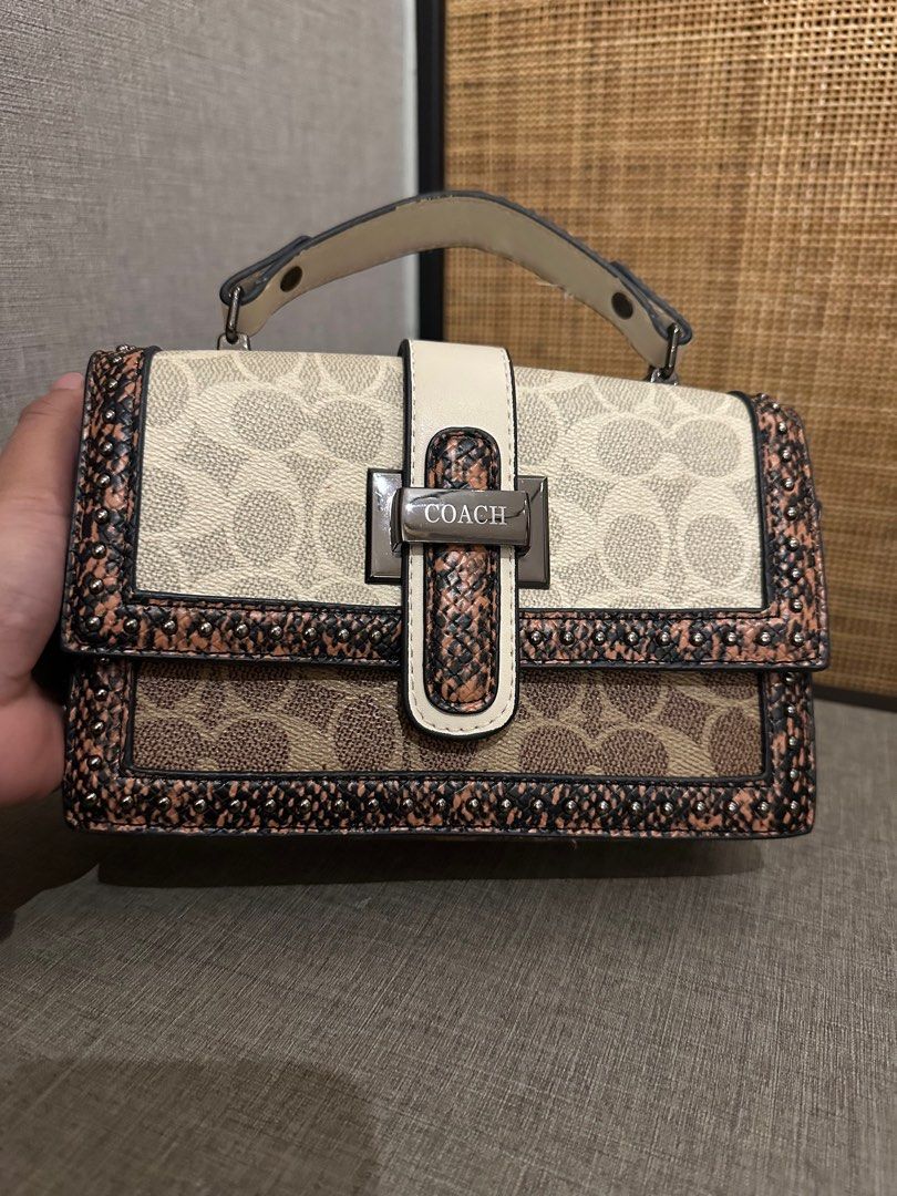 Coach 
Studded Flap Sling Bag