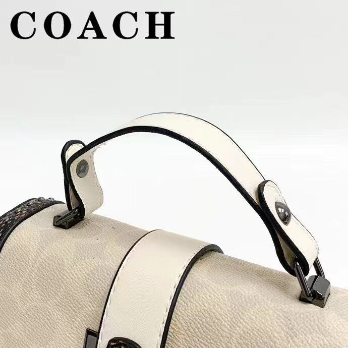 Coach 
Studded Flap Sling Bag
