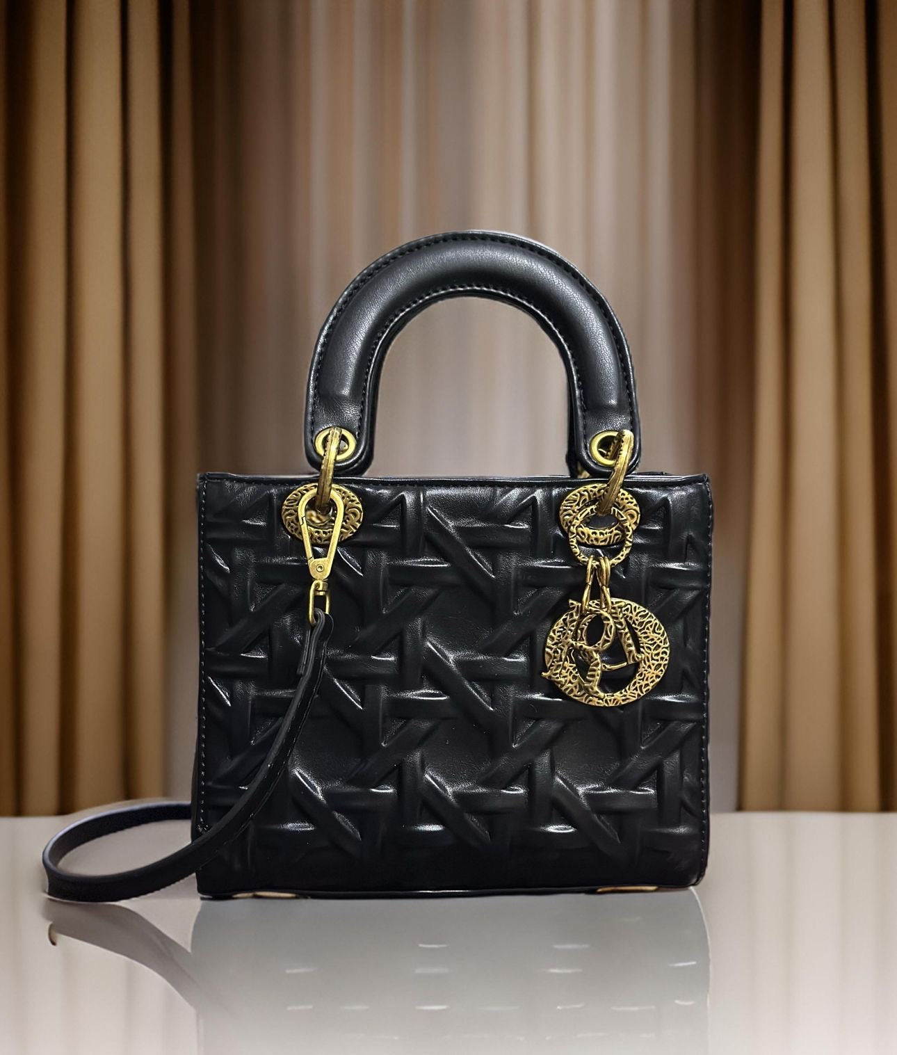 Medium Lady Dior Bag
Black Graphic Cannage Calfskin