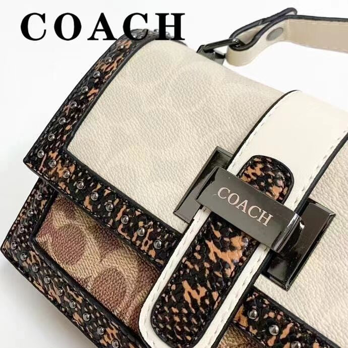 Coach 
Studded Flap Sling Bag